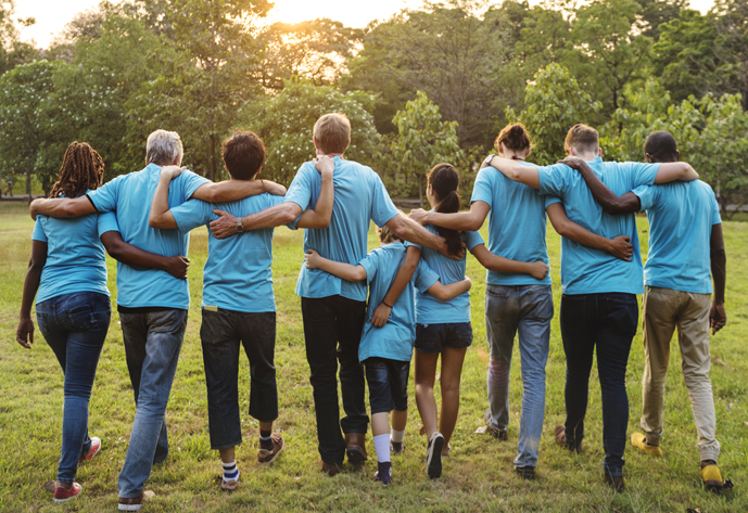 Group of diversity people volunteen arm around