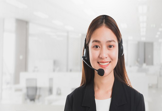 Portrait of Asian beautiful smiling woman customer support phone operator in office space banner background and copy space.Concept call center job service.